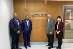 Dr.-Paul-Wilson-at-NYO-with-Shailesh-Trudy-and-Kevin-scaled
